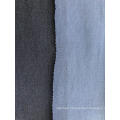 Textured double -faced denim fabric